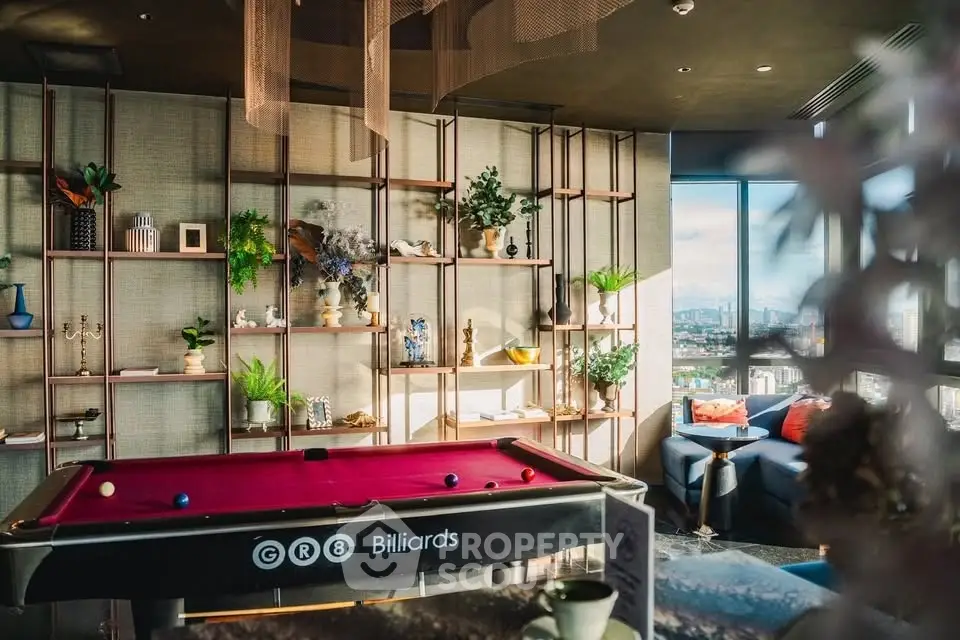 Luxurious living room with billiards table and stunning city view, perfect for entertainment and relaxation.