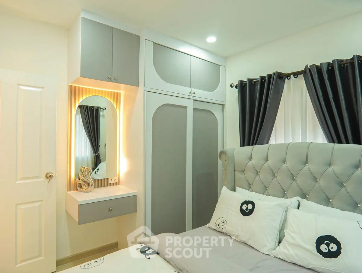 Chic modern bedroom with stylish decor and ample storage space