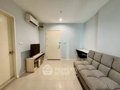 Modern living room with sleek furniture and air conditioning in a stylish apartment.
