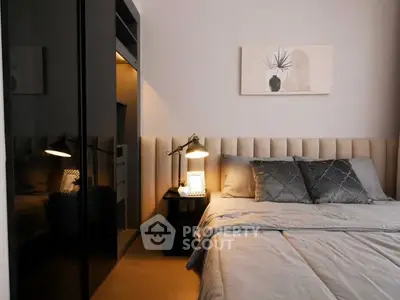 Cozy modern bedroom with elegant decor and soft lighting