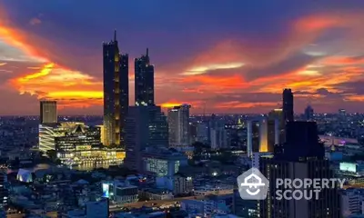 Stunning city skyline view at sunset with vibrant colors and modern skyscrapers.