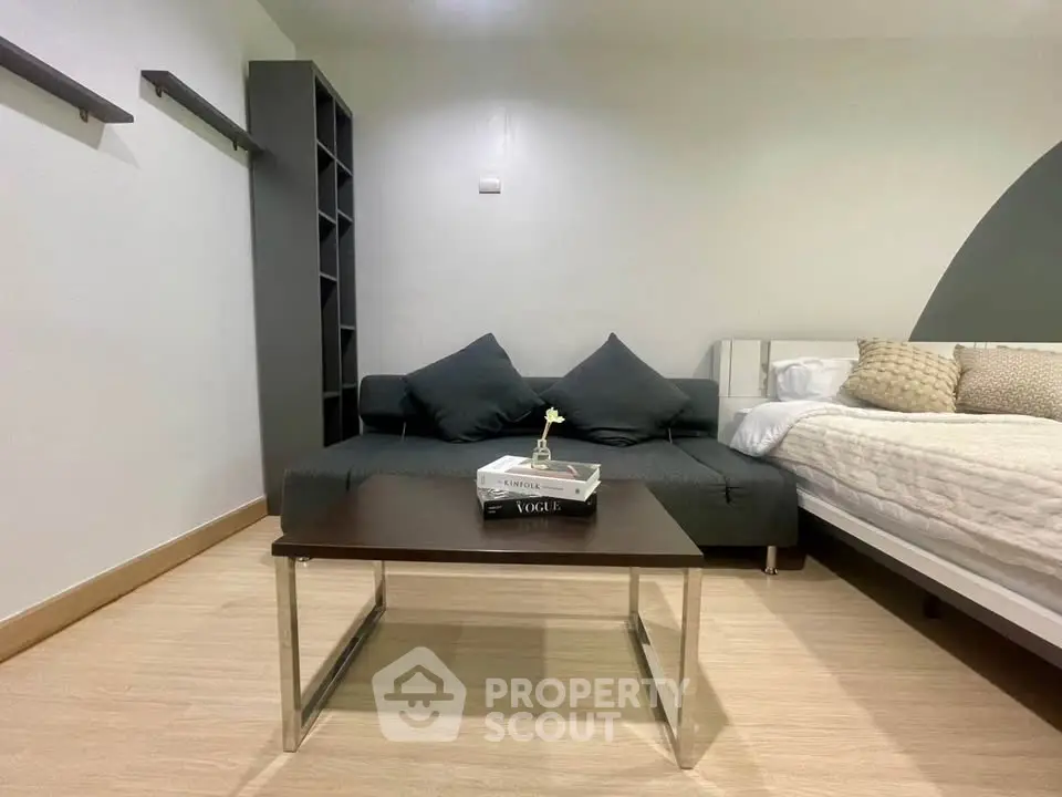 Modern studio apartment with cozy sofa and stylish decor