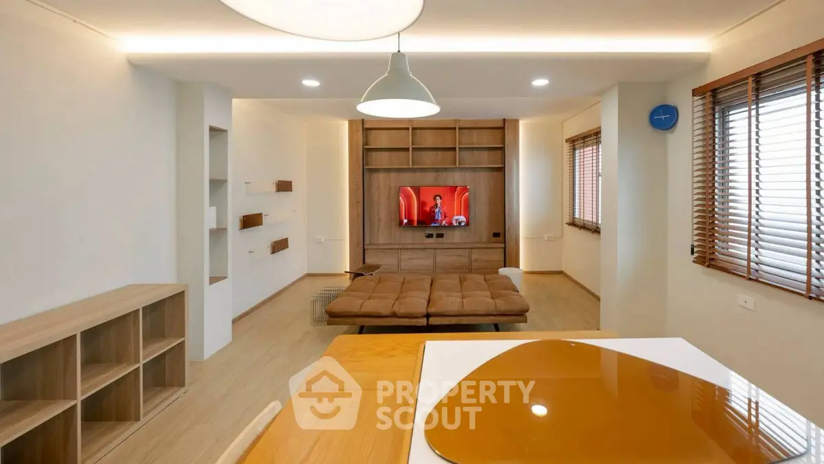 Modern living room with stylish furniture and wooden accents