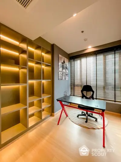 Modern study room with sleek desk and illuminated shelving