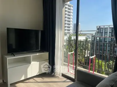 Modern living room with balcony view in urban apartment