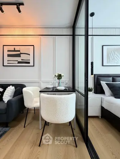 Modern living room with elegant dining area and stylish decor
