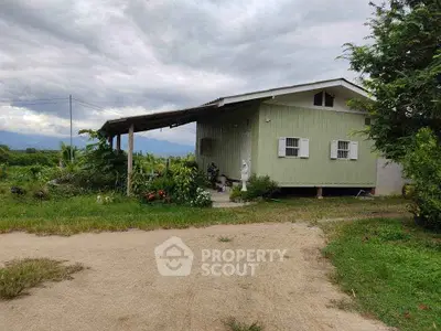 Charming rural home with lush greenery and mountain views, perfect for nature lovers seeking tranquility.