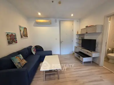 Cozy living room with modern decor and comfortable seating