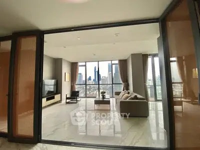 Luxurious living room with panoramic city view and elegant modern decor