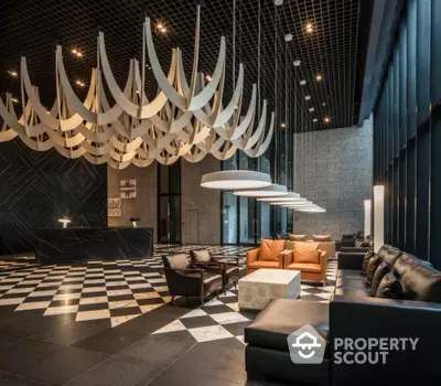 Luxurious modern lobby with elegant seating and striking ceiling design