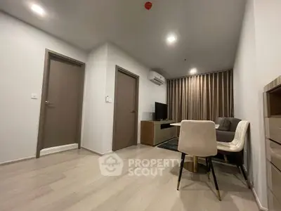Modern living room with sleek furniture and ambient lighting