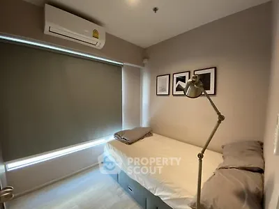 Cozy bedroom with modern decor and natural light