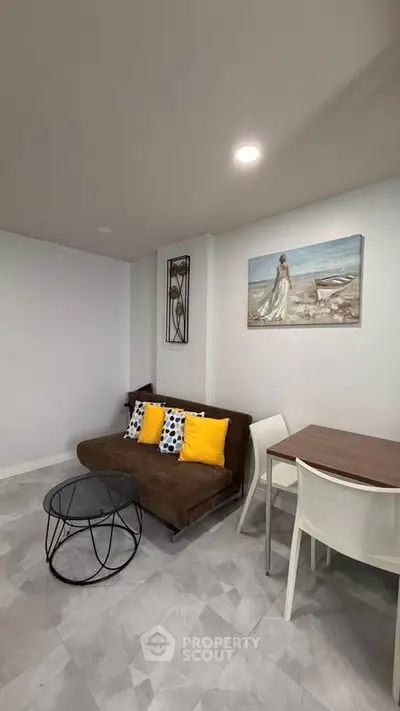 Modern living room with stylish decor and cozy seating area
