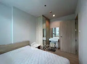 Modern bedroom with minimalist design and ample natural light