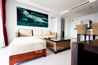 Spacious modern living room with elegant decor and comfortable seating in a luxury apartment.