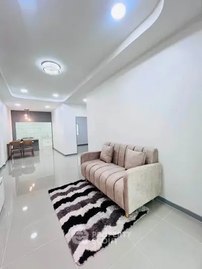 Modern living room with sleek design and cozy sofa in a bright apartment