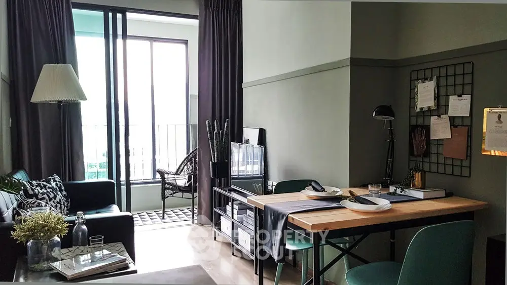 Chic modern living room with balcony view, stylish decor, and natural light.