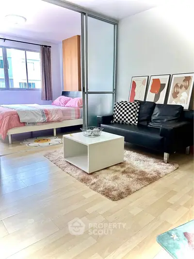 Modern studio apartment with stylish decor and natural light