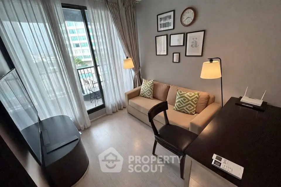 Cozy living room with modern decor and balcony view in urban apartment