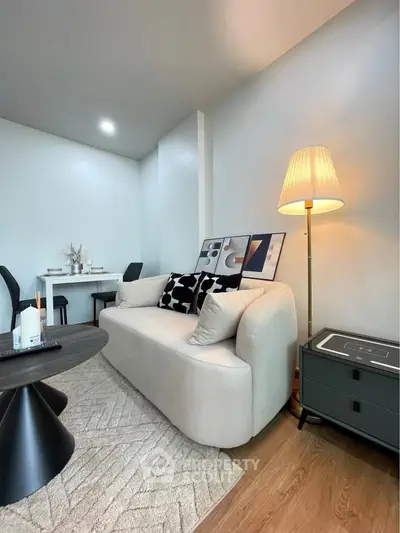 Modern living room with stylish decor and cozy seating area