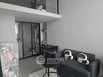Modern living room with loft design, stylish decor, and cozy seating area in a contemporary apartment.