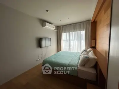 Modern bedroom with natural light and minimalist decor