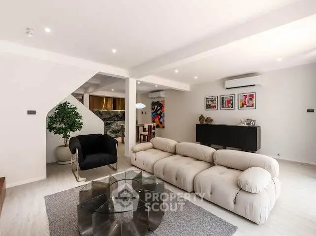 Luxurious modern living room with plush sofa and stylish decor