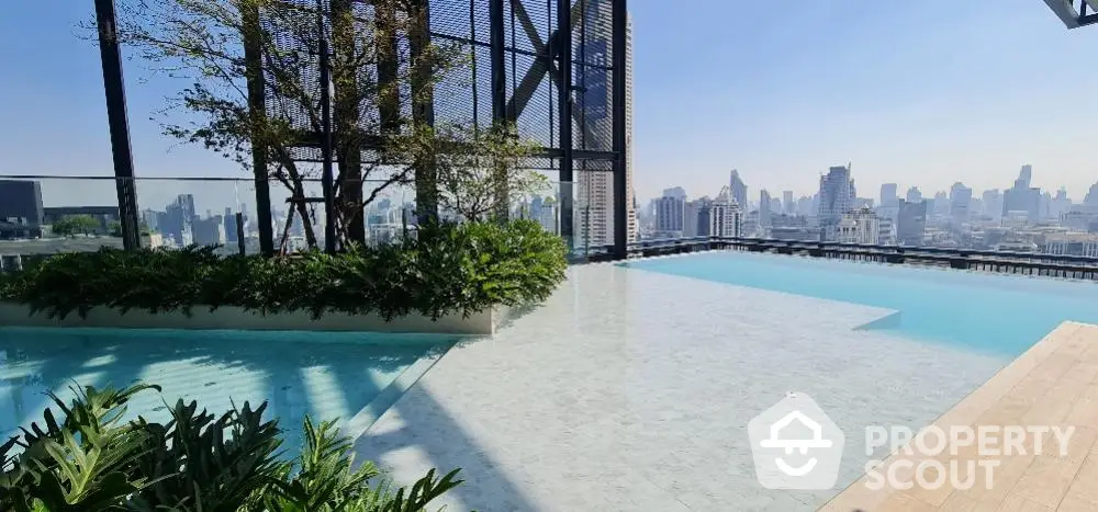 Stunning rooftop infinity pool with panoramic city skyline views