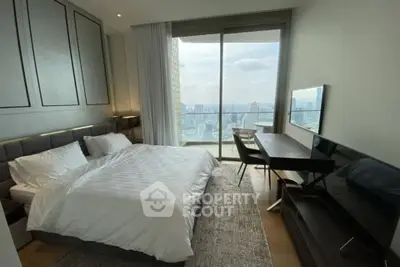 Luxurious bedroom with stunning city view and modern furnishings