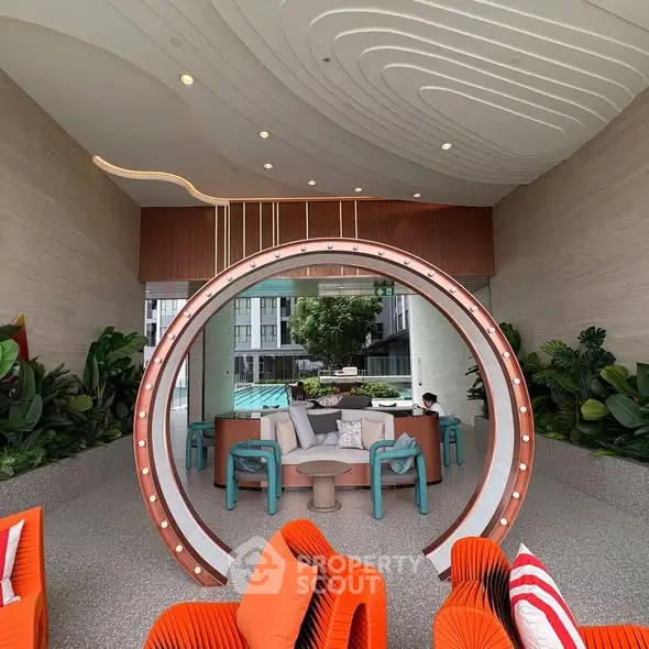 Luxurious modern living room with unique circular design and vibrant seating