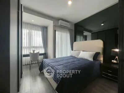 Modern bedroom with elegant decor and natural light
