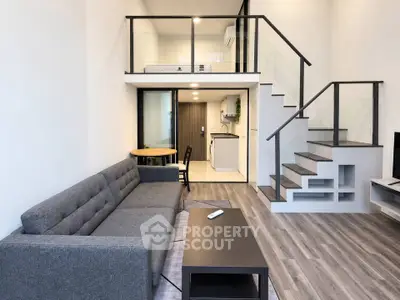Modern loft apartment with stylish living room and mezzanine bedroom