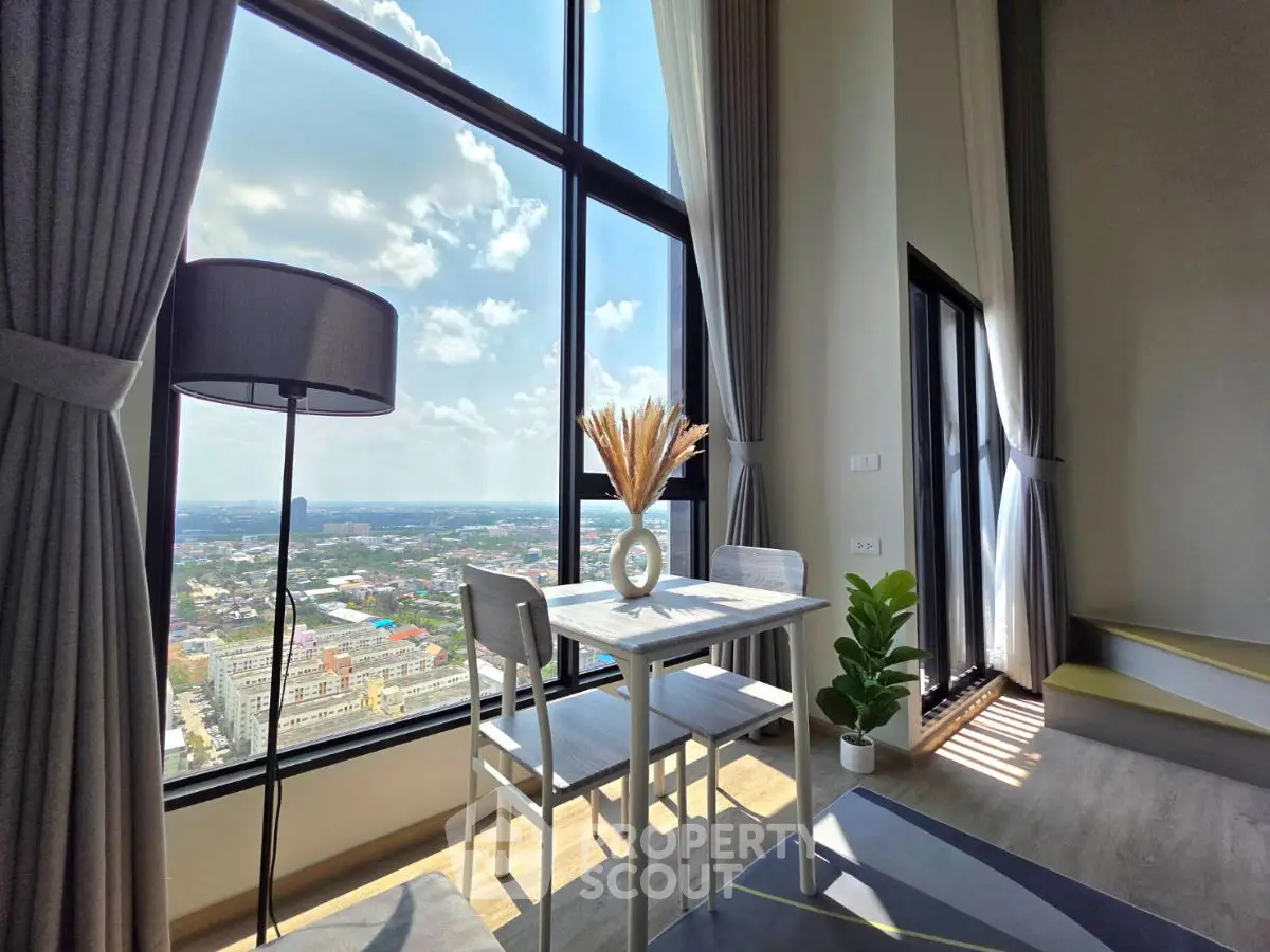 Stunning high-rise apartment with panoramic city views and elegant interior design.