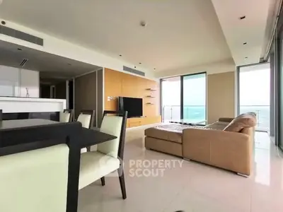 Spacious modern living room with panoramic views and elegant furnishings