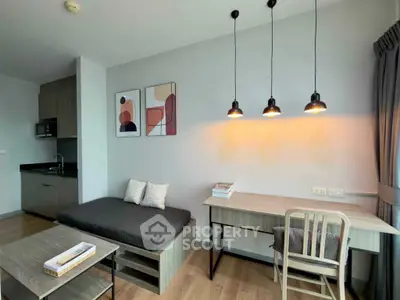 Modern studio apartment with stylish decor and functional workspace