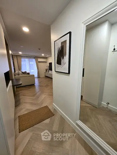 Modern apartment entrance with stylish decor and cozy living area
