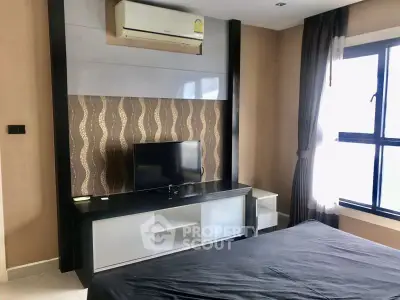 Modern bedroom with stylish TV stand and air conditioning unit
