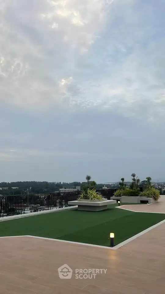 Stunning rooftop terrace with panoramic views and modern landscaping.