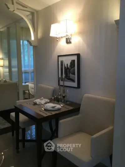 Cozy dining nook with elegant lighting and modern decor
