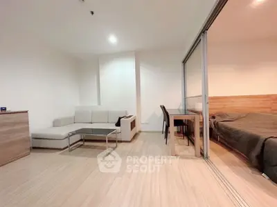 Modern studio apartment with open layout and cozy furnishings