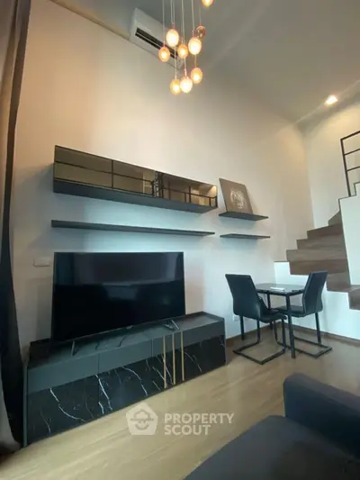 Modern living room with sleek furniture and stylish lighting