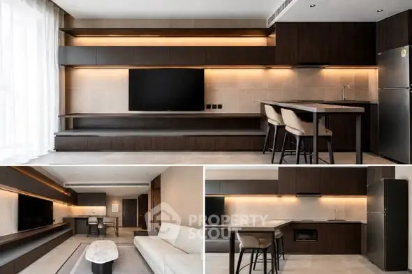Modern open-layout living room and kitchen with sleek design and integrated lighting.