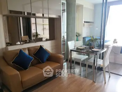 Modern living room with cozy sofa and dining area in stylish apartment