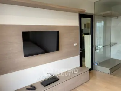 Modern living room with wall-mounted TV and sleek wooden decor