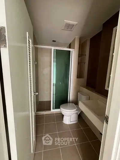 Modern bathroom with glass shower and sleek design