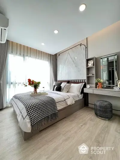 Luxurious modern bedroom with elegant decor and natural light