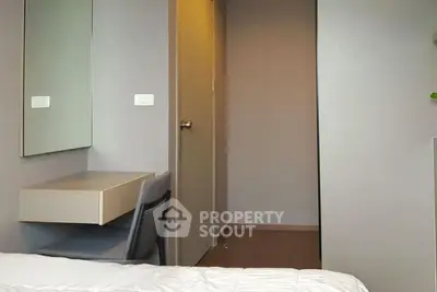 Modern bedroom with minimalist design and built-in desk