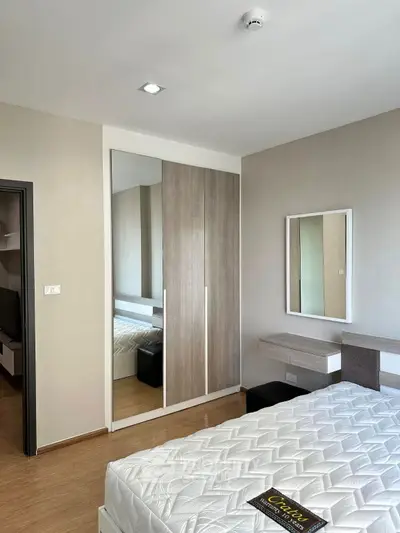 Modern bedroom with sleek wardrobe and stylish decor
