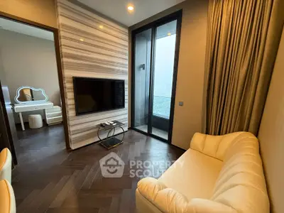 Luxurious living room with modern decor and city view balcony.