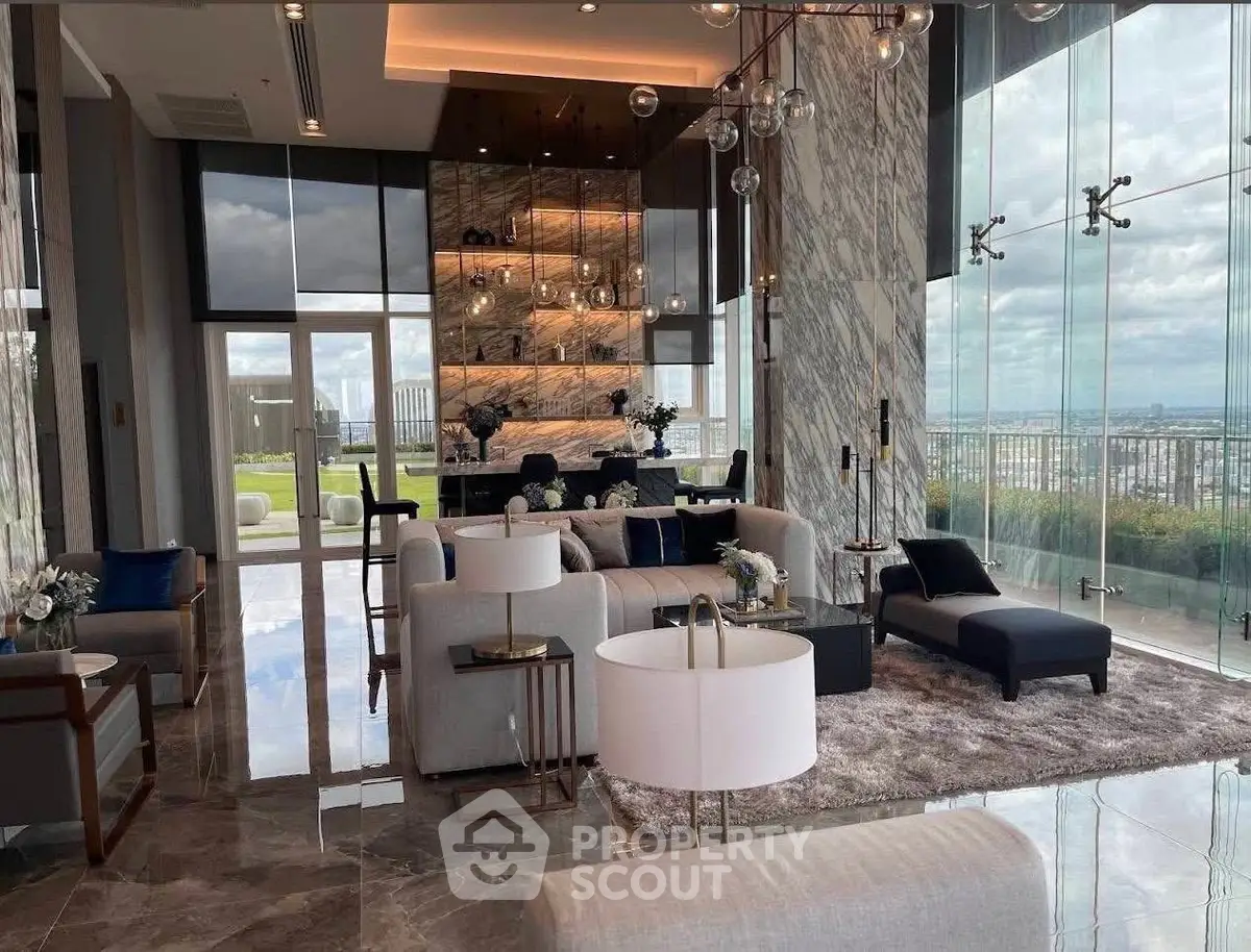 Luxurious living room with floor-to-ceiling windows and stunning city view